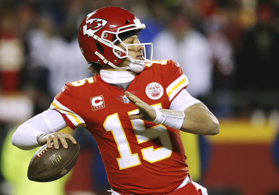 Kansas City Chiefs quarterback Patrick Mahomes throws a pass during the first half of the AFC Championship NFL football game against the New England Patriots, Sunday, Jan. 20, 2019, in Kansas City, Mo. (AP Photo/Charlie Neibergall)